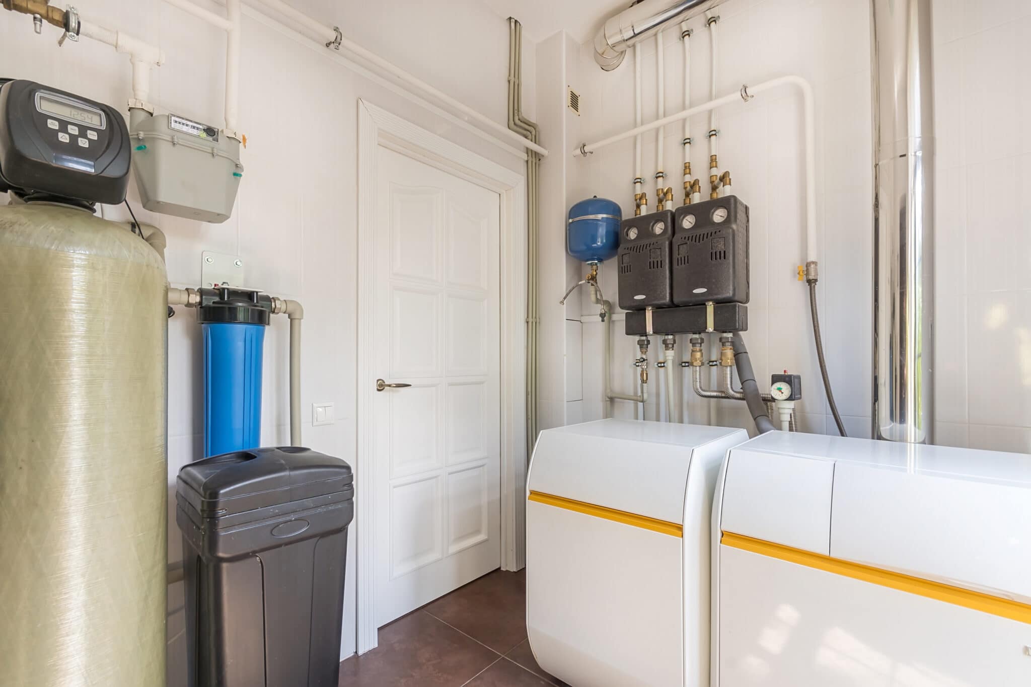 Gas Boiler room in a private house. Water filtration and softener system