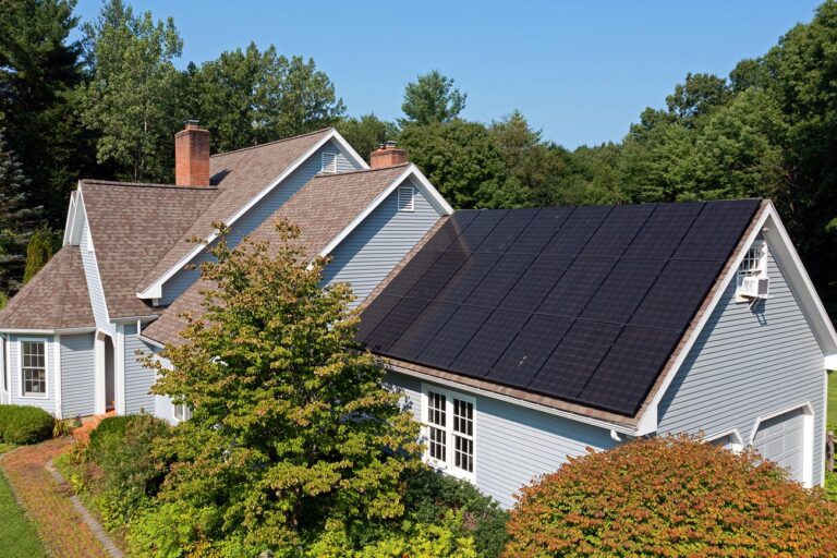 New Hampshire suburban home with all energy solar panels on the roof